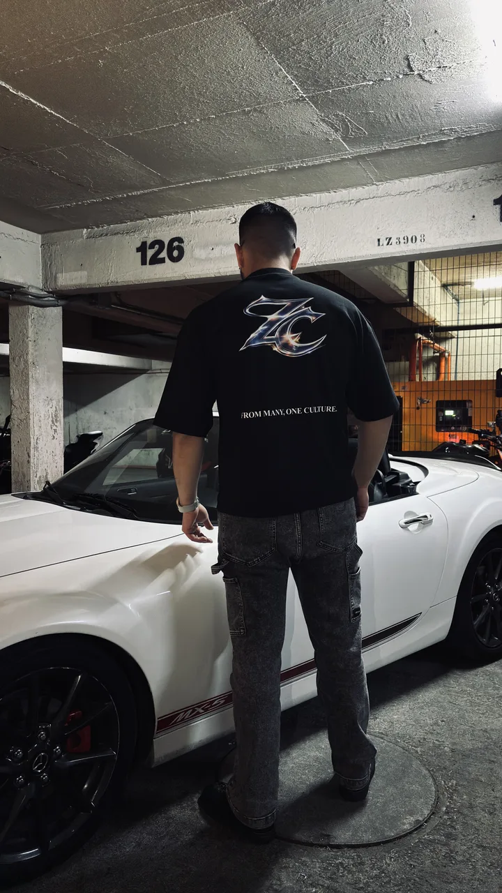 Comunidad Zaza Culture — estampado al reverso de la polera